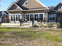 <b>Pressure Treated Wood Deck with Black Aluminum Railing</b>